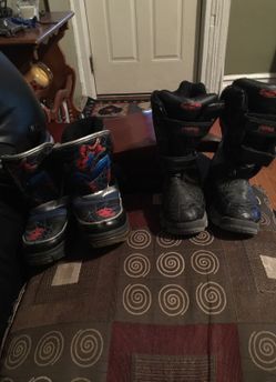 two pairs of boots of children spiderman size 1 them two pairs for $15 or one pair for $10