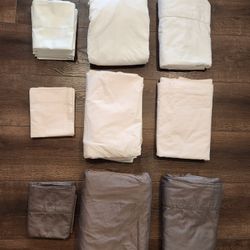 3 sets of 100% cotton Queen size bed set, 3 fitted sheets, 3 top flat sheets, 8  Pillowcases, 3 colors, clean, washed, good condition.