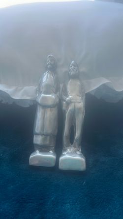 Pair of stylized mid-century modern aluminum figurines, likely by Hoselton.