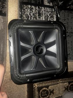 two 12 inch kicker solo-baric speakers 