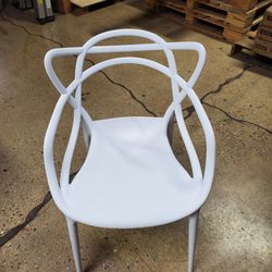 Four White Chairs Used For Indoor Or Outdoor (New)