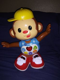 Dancing, singing, light up monkey vtech changito baila y canta con luces