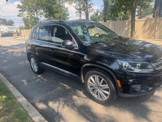 2013 Volkswagen Tiguan SUV Black 143.000 drives excellent  $3500