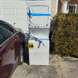 Brand New GE Washer And Dryer One Piece.