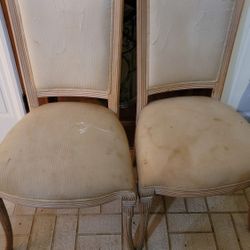 2 Wooden Dining Chairs. Great Foundation. Seat Covers Need to Be Redone.