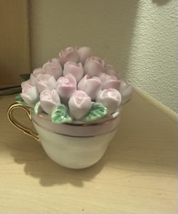 Museum of jewelry roses in a tea cup