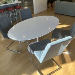 Oval Pedestal Table And chairs