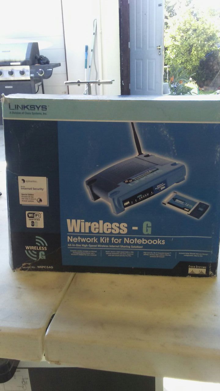 Linksys WRT54G 4-port wireless router.