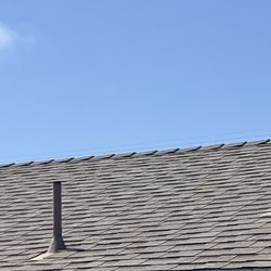 asphalt shingles approximately 2 years old