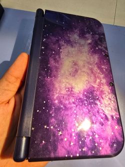 New Nintendo 3ds XL - galaxy with charger, stylus, and r4 cart