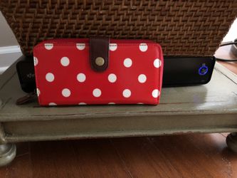 Red polka dot opens with zip and other part for credit cards and whatever else u want