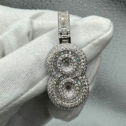A Moissanite Number charm in Silver with Moissanite of 2.66  CTW 