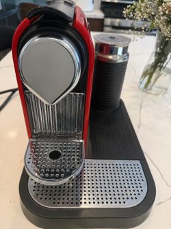 Nespresso machine with a frother