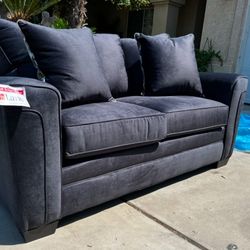 Brand New. Lane sofa. Slate color with accent pillows. Only 1 available. $249