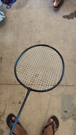 Badminton racquet and 12 nylon birdies
