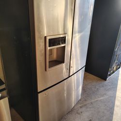 3 door lg  stainless refrigerator works good except icemaker stop working  only 250.00