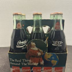 Coca Cola Around The World 6 pack full sealed bottles Santa 
