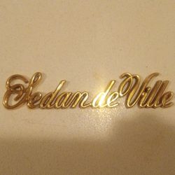 Cadillac Emblem Plastic Gold Tone 