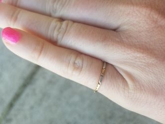 Gold ring , it is cut but not noticeable make offer