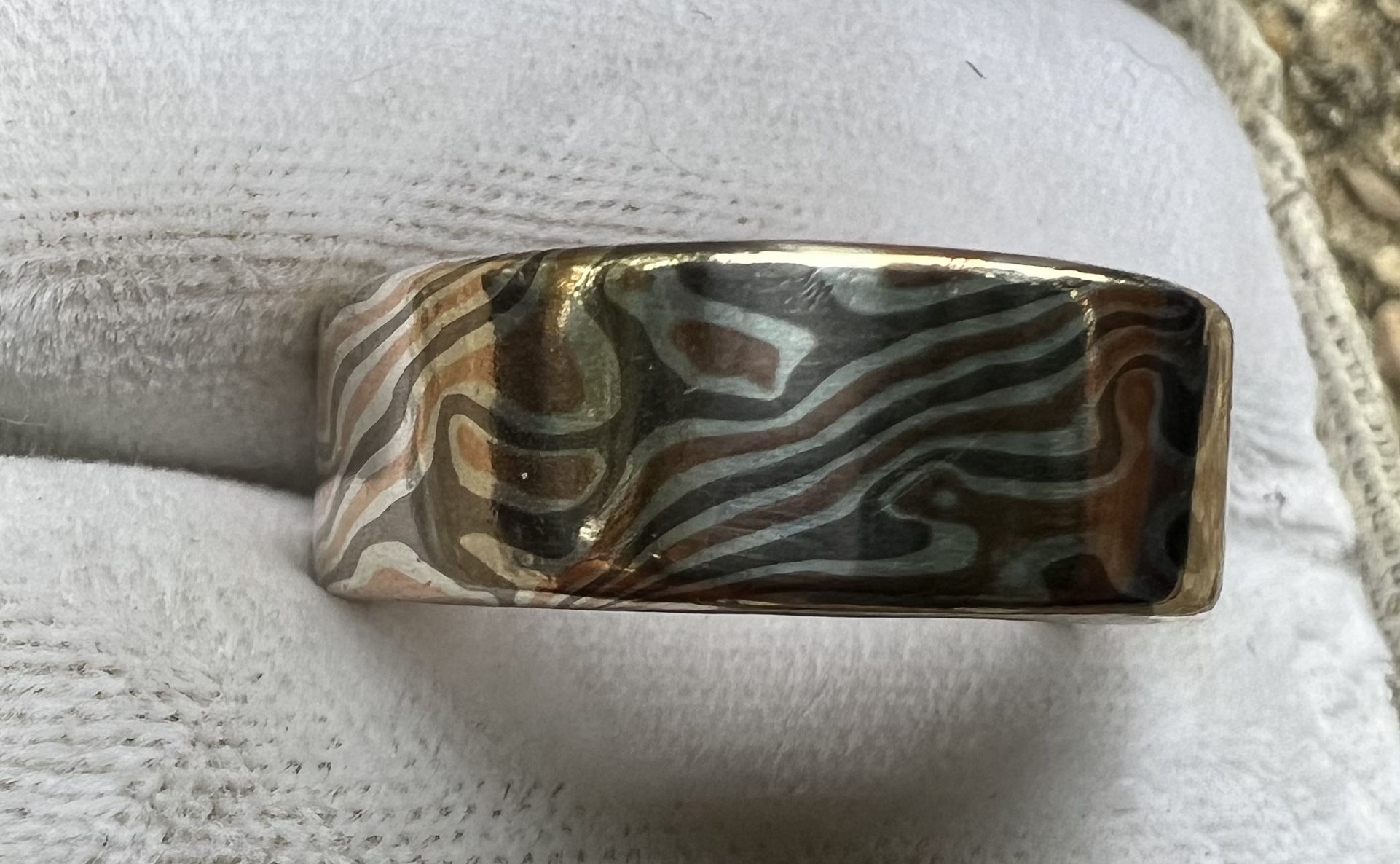 Men’s Ring Or Wedding Band: Mokume-gane By James Binion.  14K Palladium white gold; 14K red gold, and sterling silver.  Size 11.