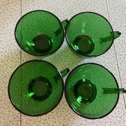 Four vintage green cups