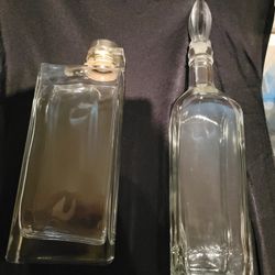 2 Decanters With Toppers 