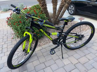 Schwinn Traxion Mountain Bike for Adult Men Women  Matte  Grey/Neon Green, 29-Inch Wheels, Full Suspension, 24-Speed Shimano Drivetrain