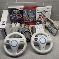 NINTENDO WII with Games And Remotes