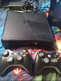 Xbox 360 console with games, $130