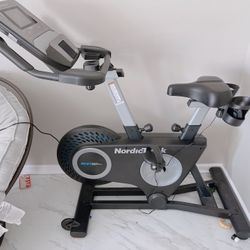 NordicTrack Studio Bike with 7” Smart HD Touchscreen and 30-Day iFIT Family Membership