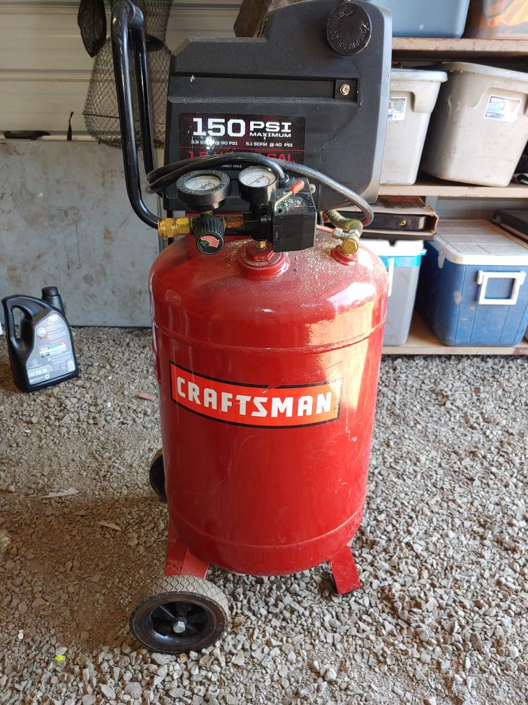 1.5 hp vertical 20 gallon direct drive oil free craftsman compressor with 50 ft of hose on steel air hose real like new