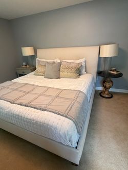 Lovely Upholstered King Bed Slightly smaller. Made to fit split box springs and mattresses. 79w x 83l x 53h Interior is 75 x 76 Smoke free