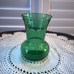 Vintage green glass vase. 3.75" tall.