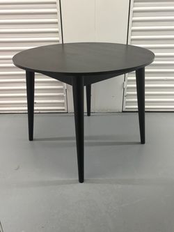 Round, black dining table —Solid, REAL wood