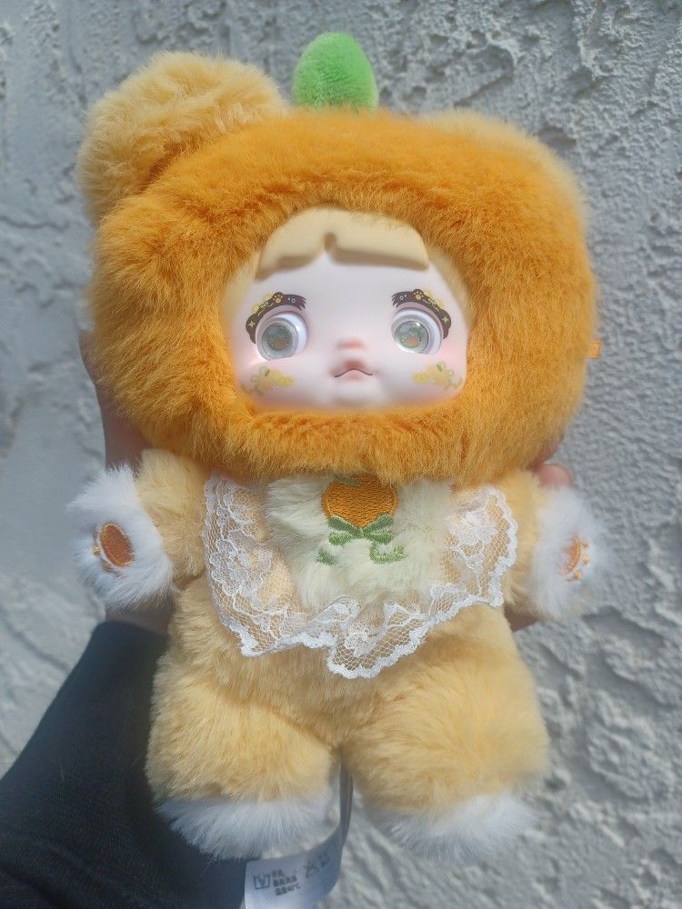 Nommi Orange Doll
