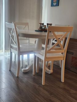 Small white dining table and 4 chairs