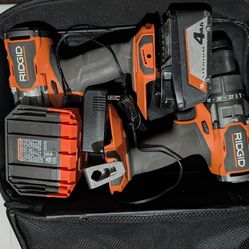 Two RIDGID brushless Drills with 1 case, battery, charger.