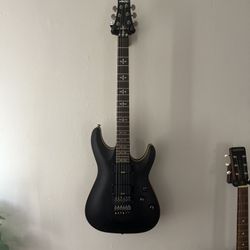 Schecter Diamond Series (C-1 style model with a Floyd Rose tremolo)