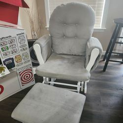 Gray rocker and ottoman with white frame