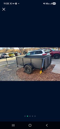 Lightly used once to move..still new 2025 flat bed trailer.. clean NM title
