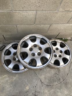 Full set of Mazda 15 inch rims.
