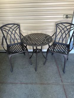 Heavy patio set table and 2 chairs
