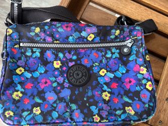 Neon floral purse. Weather resistant 8x11