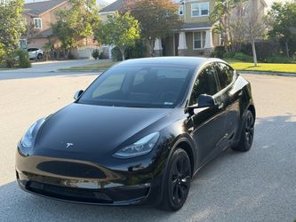2023 Tesla Model Y Long Range AWD with Factory Tow Package.