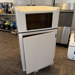 White commercial trash can