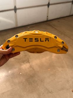 Yellow Tesla caliper