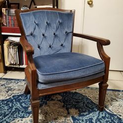 Vintage sapphire blue tufted velvet and wooden armchair