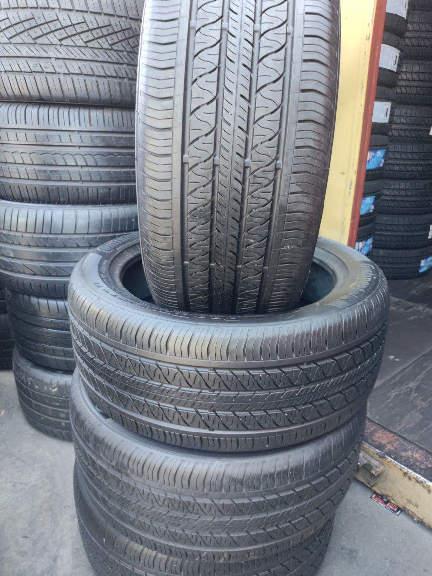 SET OF 4 GOOD USED TIRES. P245 /55 /R19. CONTINENTAL 