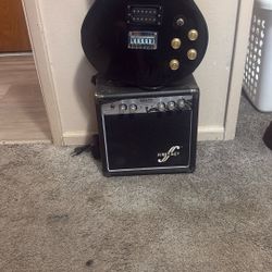 Electric Guitar And Amp With Cable 