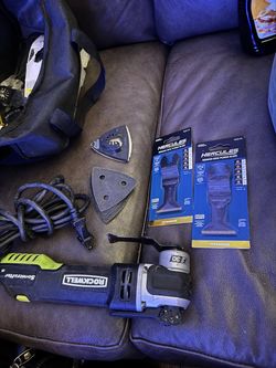 Rockwell multi tool with extra new cutting blades 55 and sanding pads need gone moving soon